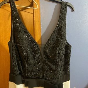 Black and white long dress. Worn once for a pageant. Has some mystery spots